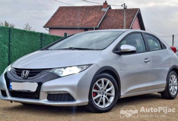 Honda Civic 1.4 i-vtec																											2012. godište